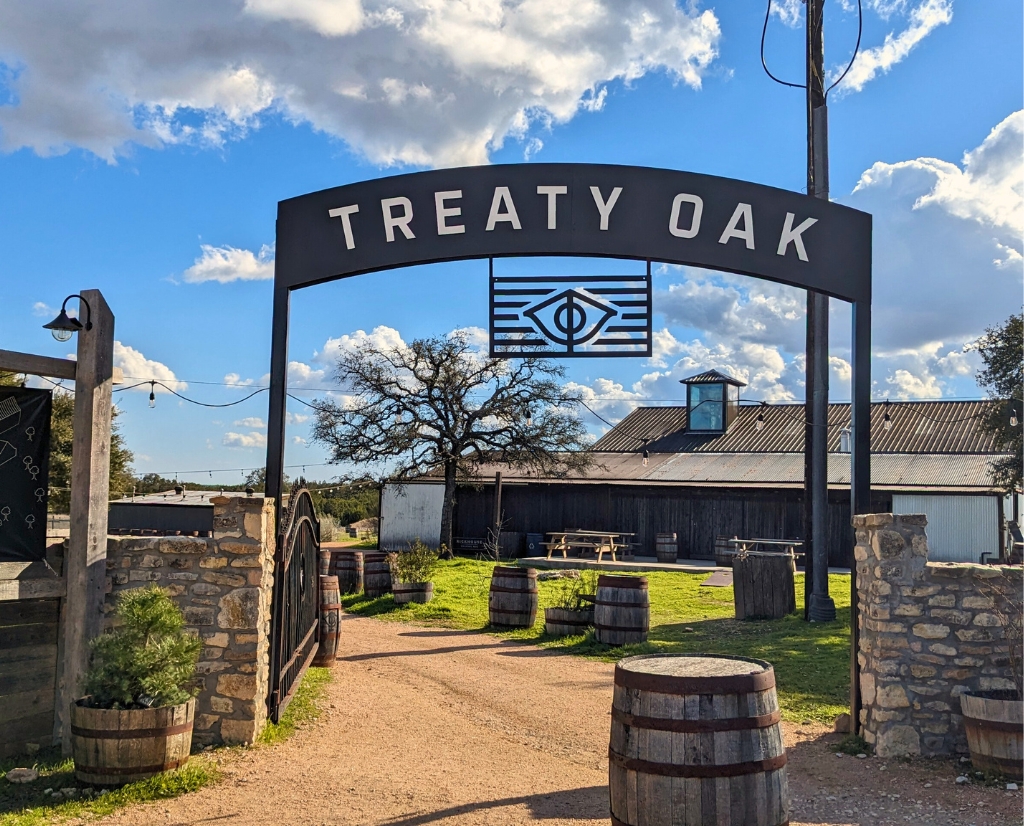 Photo of the entrance to Treaty Oak Distilling in Dripping Springs, Texas, a short drive from the Heywood Hotel in Austin.